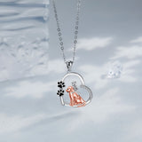 Naszyjnik w kształcie serca z psem i dziewczynką